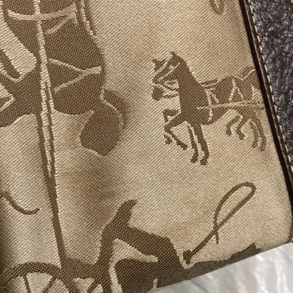 Coach carriage brown wristlet bag
